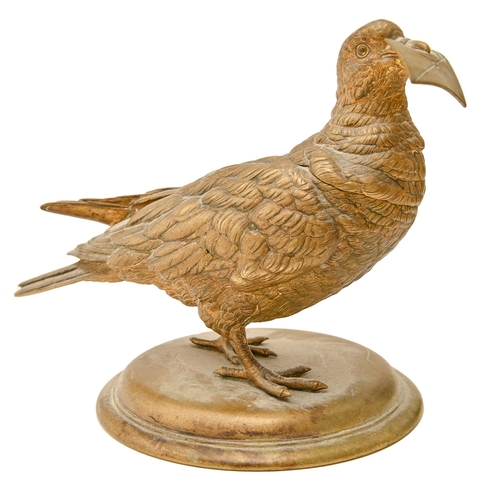 930 - An Austrian or German gilt brass inkwell in the form of a bird with a letter in its beak, c1900, on ... 