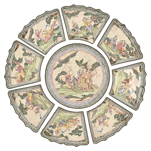 935 - A Canton painted enamel nine piece famille rose dish set, early 19th c, painted with groups of figur... 