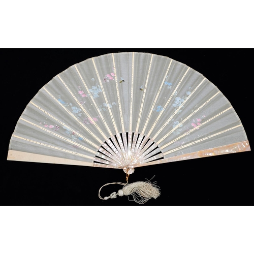 579 - Two French mother of pearl fans, c1900, the silk or gauze leaf painted with flowers, one signed with... 