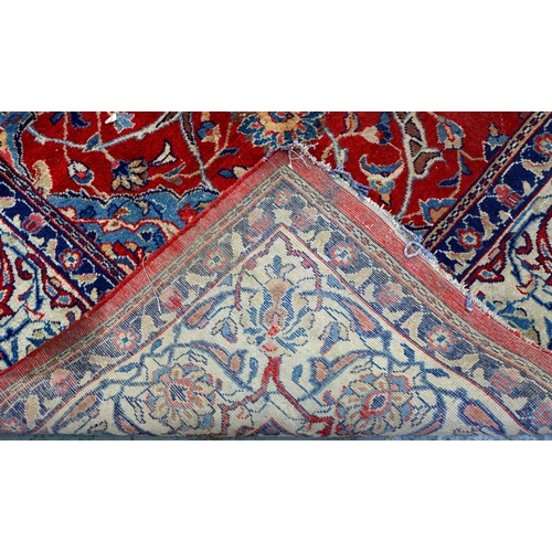 888 - An antique eastern carpet, Heriz, 380 x 300cm