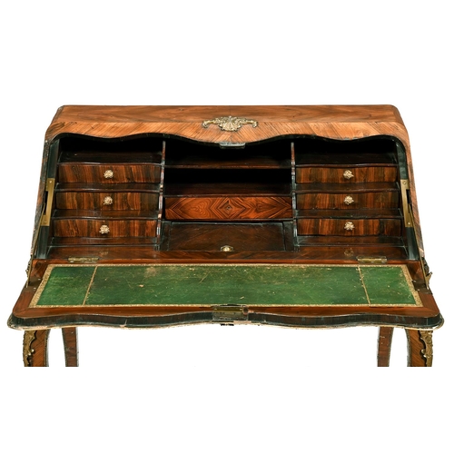 967 - A Victorian kingwood bureau in the form of a Louis XV bureau en pente, c1850, with gilt brass mounts... 