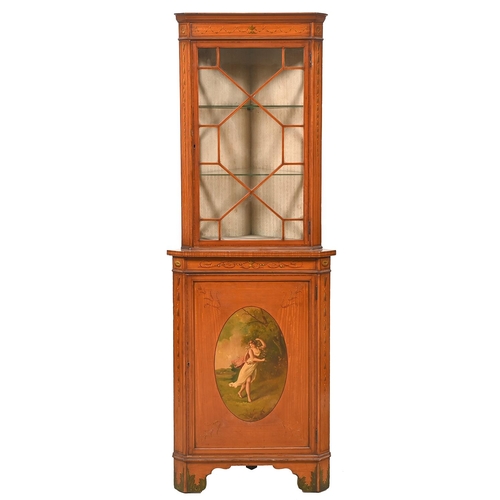 1025 - An Edwardian painted satinwood standing corner cabinet, crossbanded in rosewood and line inlaid, pai... 