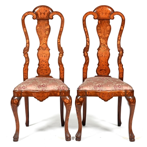 1032 - A pair of Dutch walnut and marquetry chairs, c1900, the splat with bird and flowers, on cabriole leg... 