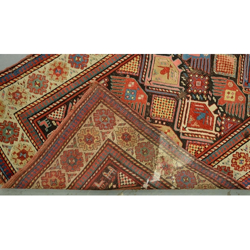 1040 - An antique Kazak runner, c1910, 115 x 255cm