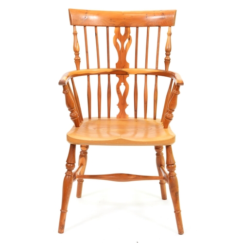 1018 - A yew wood comb back Windsor chair, late 20th c, with elm seat