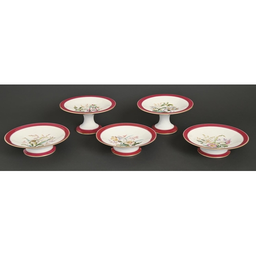 205 - A Limoges dessert service, late 19th c, printed and painted with botanical flowers in claret and gil... 