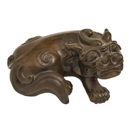 316 - A South East Asian bronze sculpture of a dog of Fo, 10cm l