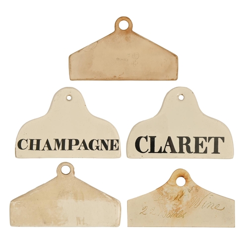 325 - A pair of Copeland glazed earthenware CLARET and CHAMPAGNE cellar bin labels, 19th c, 13.5cm l ... 