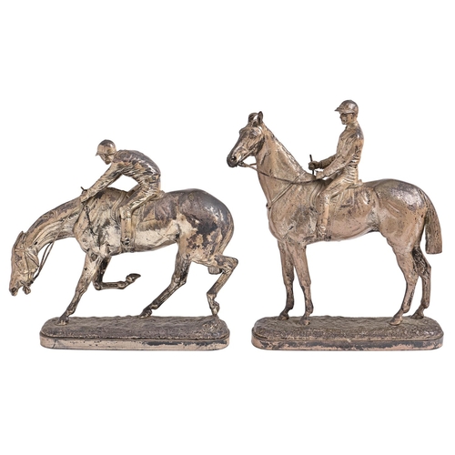 404 - A pair of silvered bronze equestrian statuettes of 