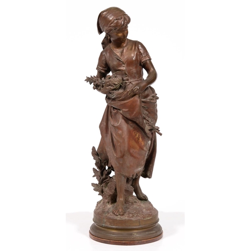 408 - A French bronze statuette of a gleaner with a bird's nest, cast from a model by Mathurin Moreau (182... 