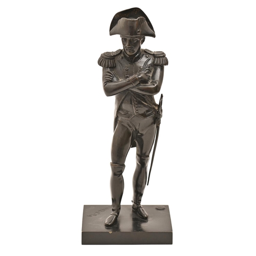 423 - A bronze statuette of Napoleon Bonaparte, cast from a model by Paul Comolera, 20th c, even black pat... 