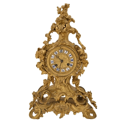 430 - A French ormolu rococo revival mantel clock, mid 19th c, in Louis XV style, with enamel chapters, be... 