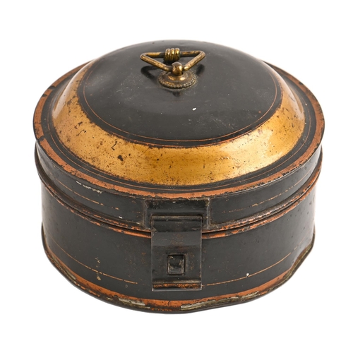 454 - A Victorian japanned tinplate spice box,  with domed lid, the interior divided into six compart... 