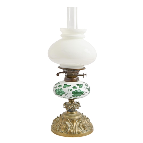 460 - A Victorian stamped brass oil lamp, with white overlay green glass fount, Hink's & Sons patent d... 