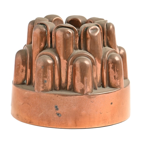 474 - An English copper jelly mould, c1900, 12cm h, stamped 3 6 0