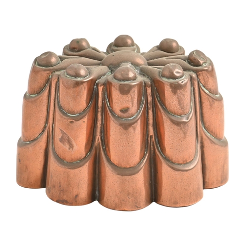 475 - An English copper jelly mould, c1900, 17cm l, stamped 50