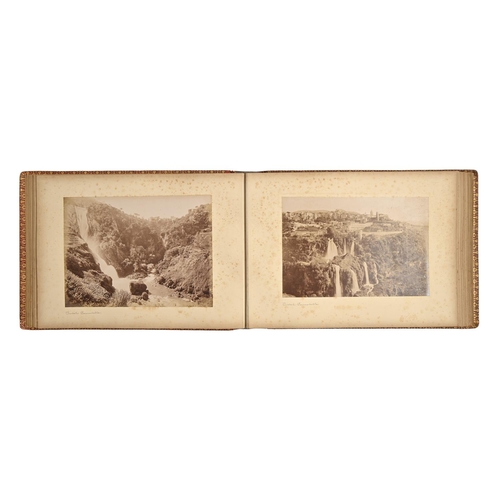 483 - A Victorian photograph album, of 80 mounted whole plate (19 x 27cm and circa) photographs of Italy, ... 