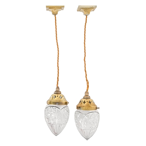 507 - A pair of Edwardian brass and cut glass electric corridor lamp pendants, Holophone Company, early 20... 