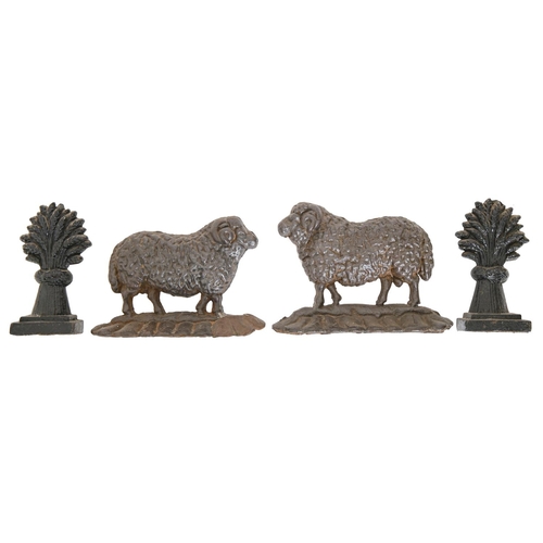 535 - A Victorian cast iron ram door stop, 25cm w, another, smaller, 24cm w, a matched pair of 19th c... 