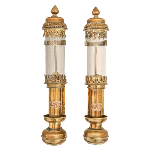 549 - A pair of sheet brass oil lamps, applied G W R badge, glass shades, 26cm h