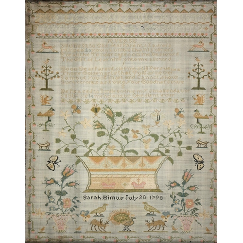 558 - A George III linen sampler, by Sarah Himus July 20 1798, worked with a flower filled jardiniere flan... 