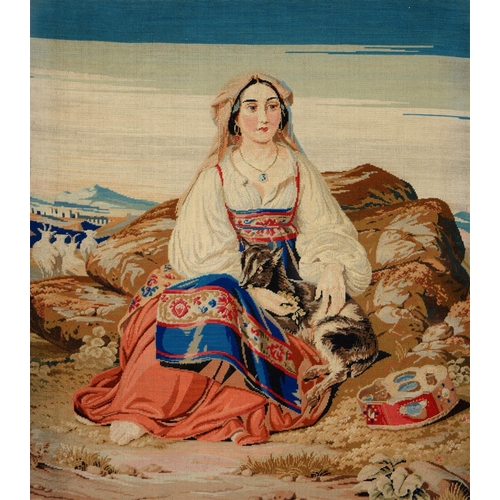 561 - A Victorian Berlin woolwork picture of a Circassian woman seated in a landscape, 60 x 53.5cm... 