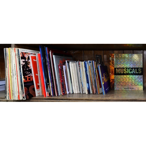 595 - A collection of British theatre programs, late 20th c, two related books and approximately 25 vinyl ... 