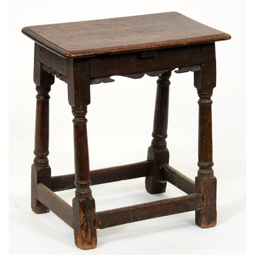 851 - A Charles II oak joined stool, on turned legs, 50cm h; 30 x 45cm