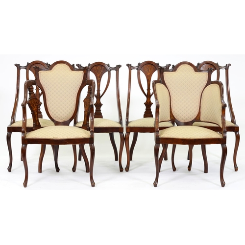 877 - An Edwardian mahogany and inlaid salon suite, on cabriole legs with padded seats and padded backs to... 