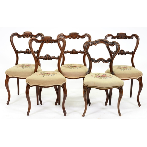 902 - One and a set of four Victorian carved walnut dining chairs