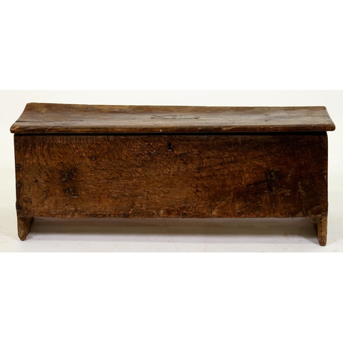 903 - An English boarded oak chest, late 18th / early 19th c, the lid applied with contemporary sheet bras... 