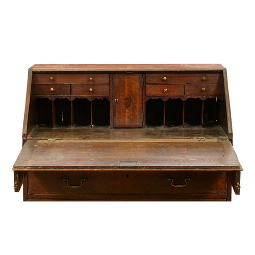 907 - A George III oak bureau, 104cm h; 49 x 91cm