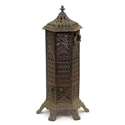 912 - A Victorian ornate cast iron hexagonal pillar stove and cover, oil burner, 82cm h