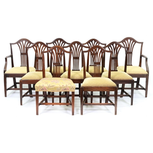 982 - A set of nine George III mahogany dining chairs, with pierced splat and slip seat, the set including... 