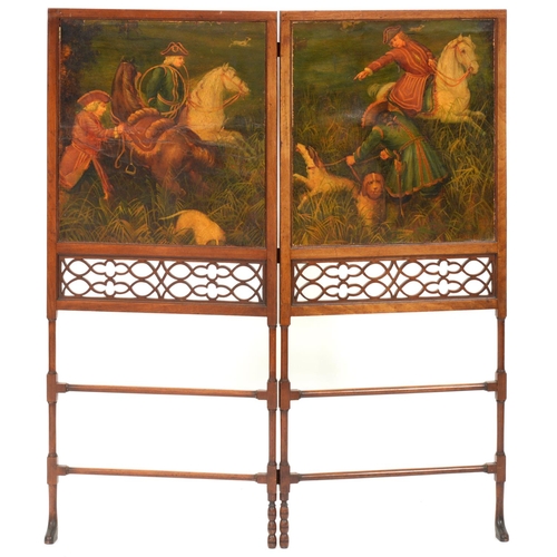 987 - A mahogany and fretwork folding firescreen, c1900, based on a design by Thomas Chippendale, with dou... 