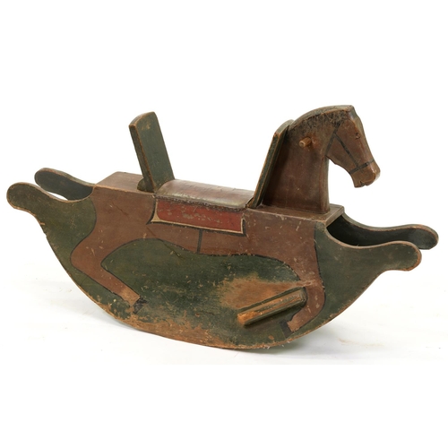 989 - A painted pine flat sided rocking horse, with padded leather seat, 54cm h