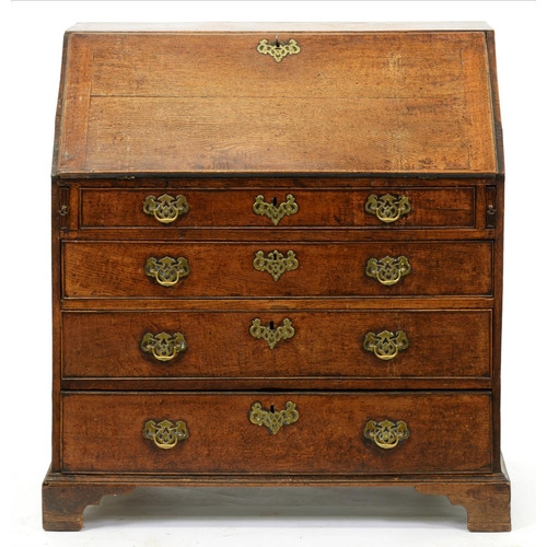 990 - A George III oak bureau, with fitted interior on bracket feet, 101cm h; 50 x 90cm