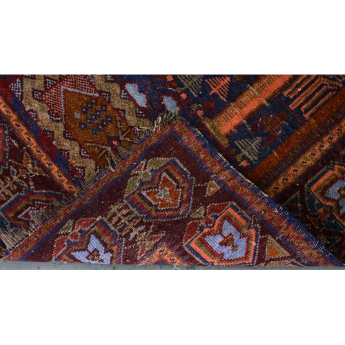 1173 - A Persian medallion rug, 20th c, 152 x 116cm, a 'minaret' rug, 138 x 82cm, (2)