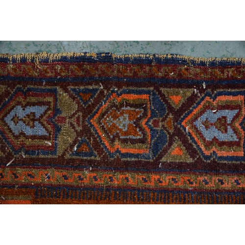 1173 - A Persian medallion rug, 20th c, 152 x 116cm, a 'minaret' rug, 138 x 82cm, (2)