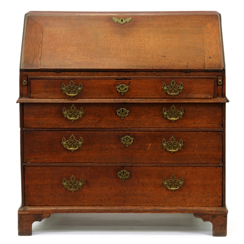 1194 - A George III oak bureau, with fitted interior, 104cm h; 54 x 96cm