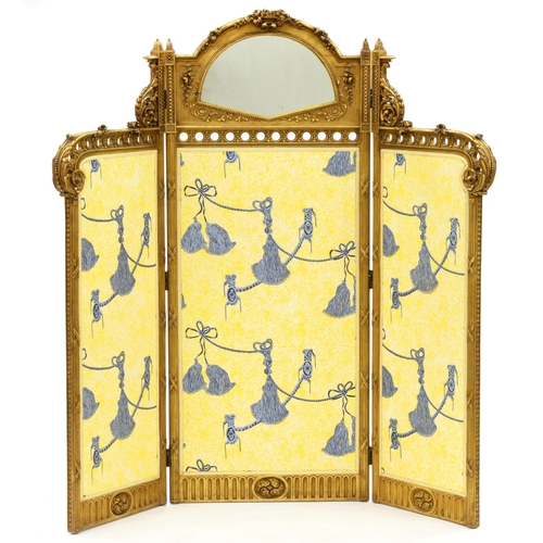 1238 - A giltwood screen, 20th c, in 19th c French style, the larger central leaf with fan shaped mirror, 1... 