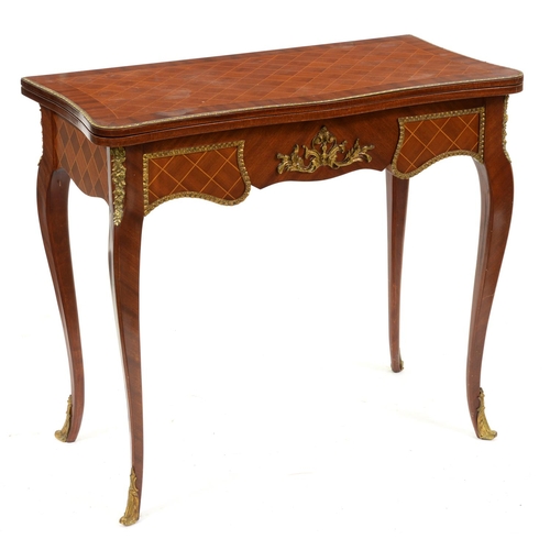 1275 - A mahogany and trellis line inlaid serpentine card table, 20th c, in Louis XV style, with gilt lacqu... 