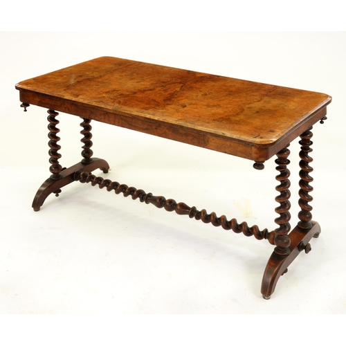 1284 - A Victorian walnut stretcher table, the quarter veneered oblong top on coupled spiral supports, 68cm... 