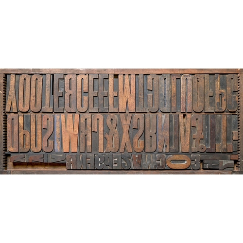 1329 - British Letterpress Printing. A case of wood type, (woodletter) first half 20th c