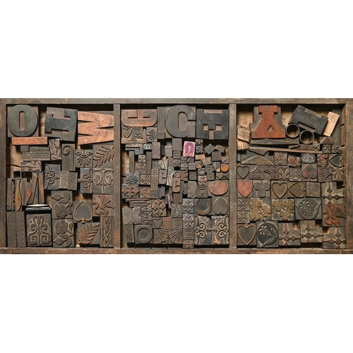 1339 - British Letterpress Printing. A case of wood type letters and symbols, first half 20th c... 