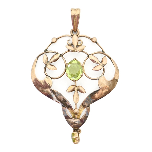 282 - A peridot openwork pendant, early 20th c, in gold, 39mm, marked 9ct, 2g