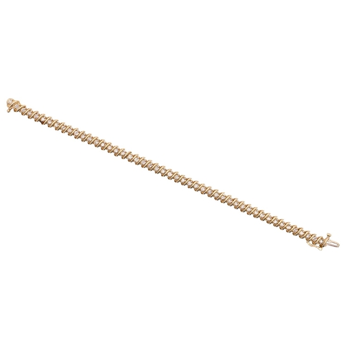 284 - A diamond bracelet, in gold, 20cm l, marked 14k, 19.2g