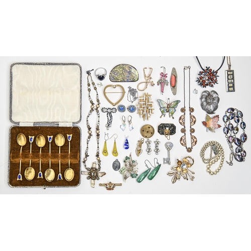 313 - A set of six gilt silver coloured metal and royal blue guilloche enamel coffee spoons, c1930, appare... 