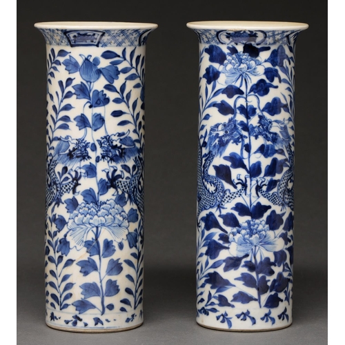 611 - A pair of Chinese blue and white sleeve vases, Qing dynasty, late 19th c, painted with dragons and f... 