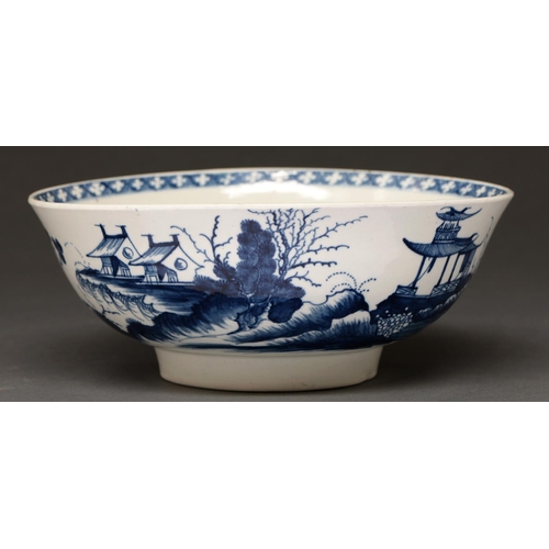 618 - A Worcester blue and white bowl, c1770, attractively if slightly eccentrically potted and painted in... 